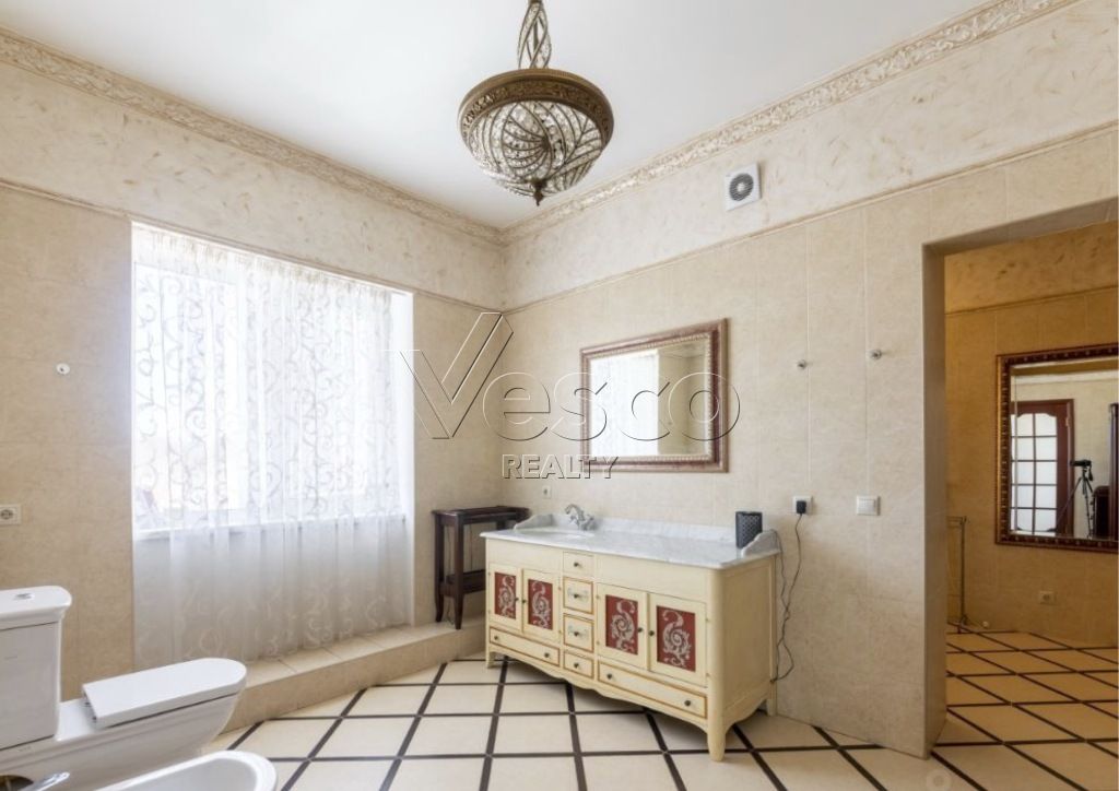 Кирпичный коттедж в классическом стиле