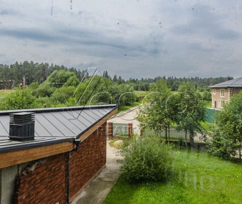 Кирпичный коттедж в стиле шале