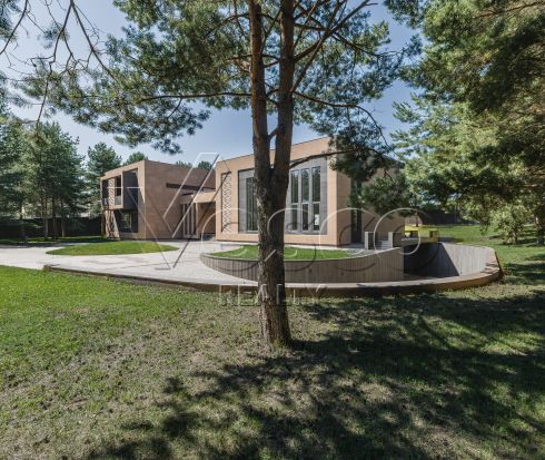 Трехуровневый коттедж в клубном поселке